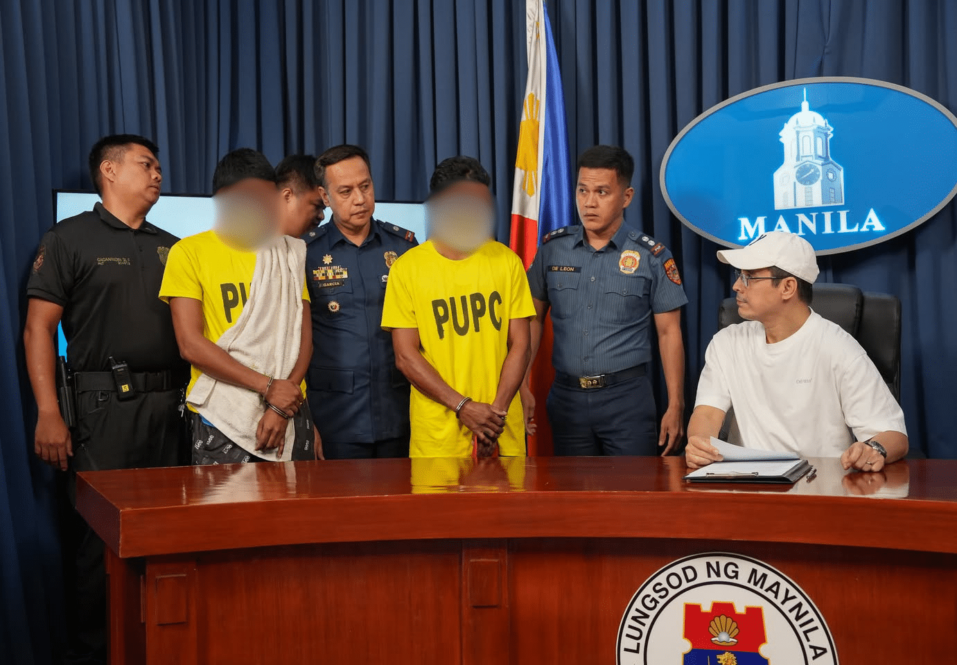 2 under custody for killing man at computer shop in Manila