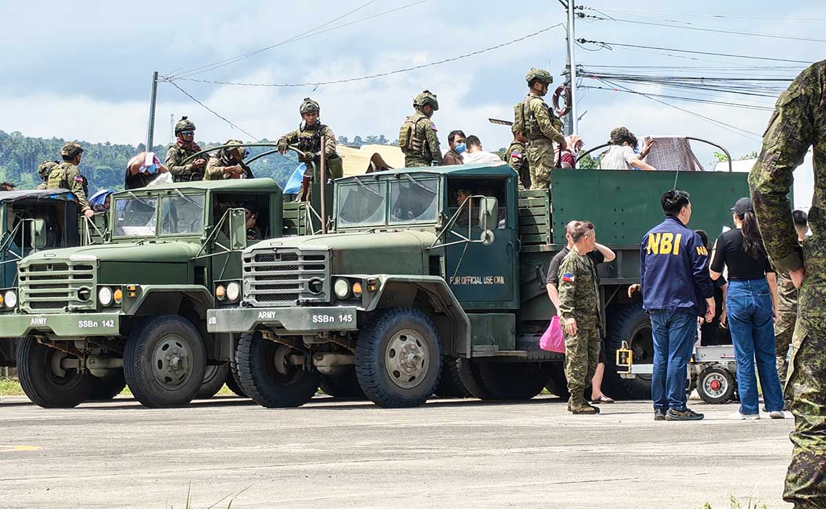 Bad weather grounds flight carrying 51 trafficking victims to Manila
