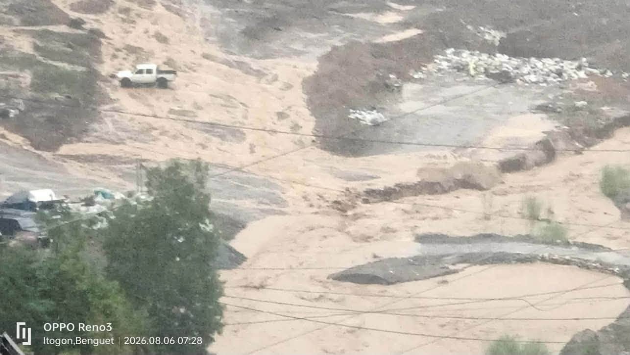 Benguet’s Antamok River swells, cuts off road in Itogon