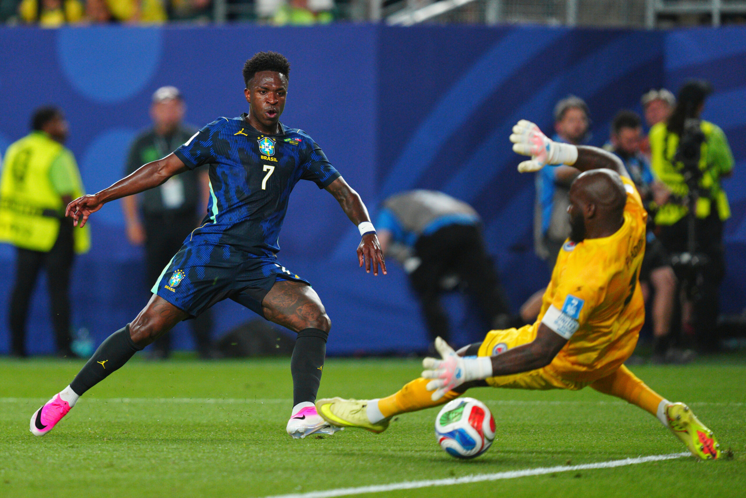 Brazil's Vinicius Junior (7) scores the third goal for his team against Haiti goalkeeper Johny Placide (1) during the World Cup Group C soccer match between Brazil and Haiti in Philadelphia, Friday, June 19, 2026.
