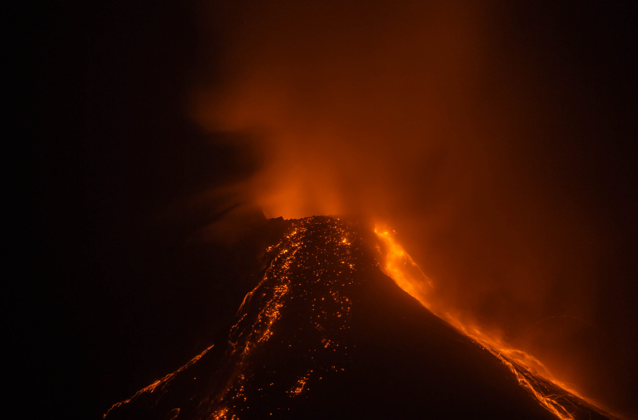 Residents near Mayon slopes prepare to evacuate