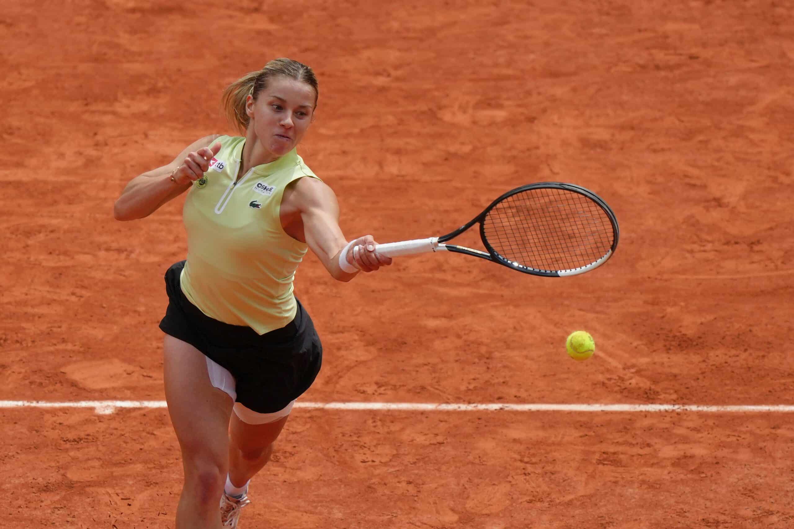 Maja Chwalinska returns to Russia's Mirra Andreeva during their final women's tennis match at the French Open in Paris, Saturday, June 6, 2026.