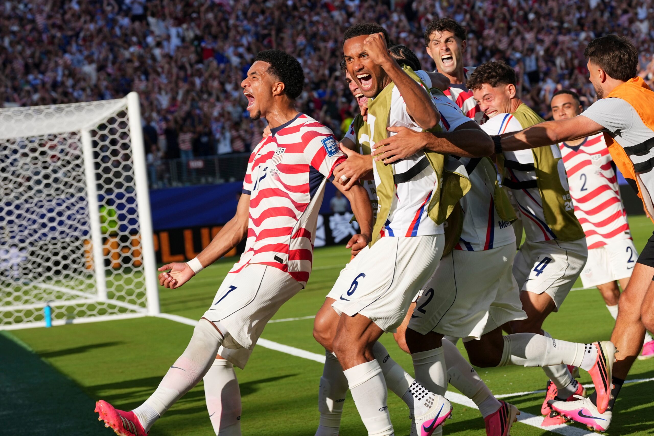 United States' Malik Tillman (17) celebrates with teammates after scoring on a free kick during the Fifa World Cup round of 32 soccer match between the United States and Bosnia in Santa Clara, Calif., near San Francisco, Wednesday, July 1, 2026. (