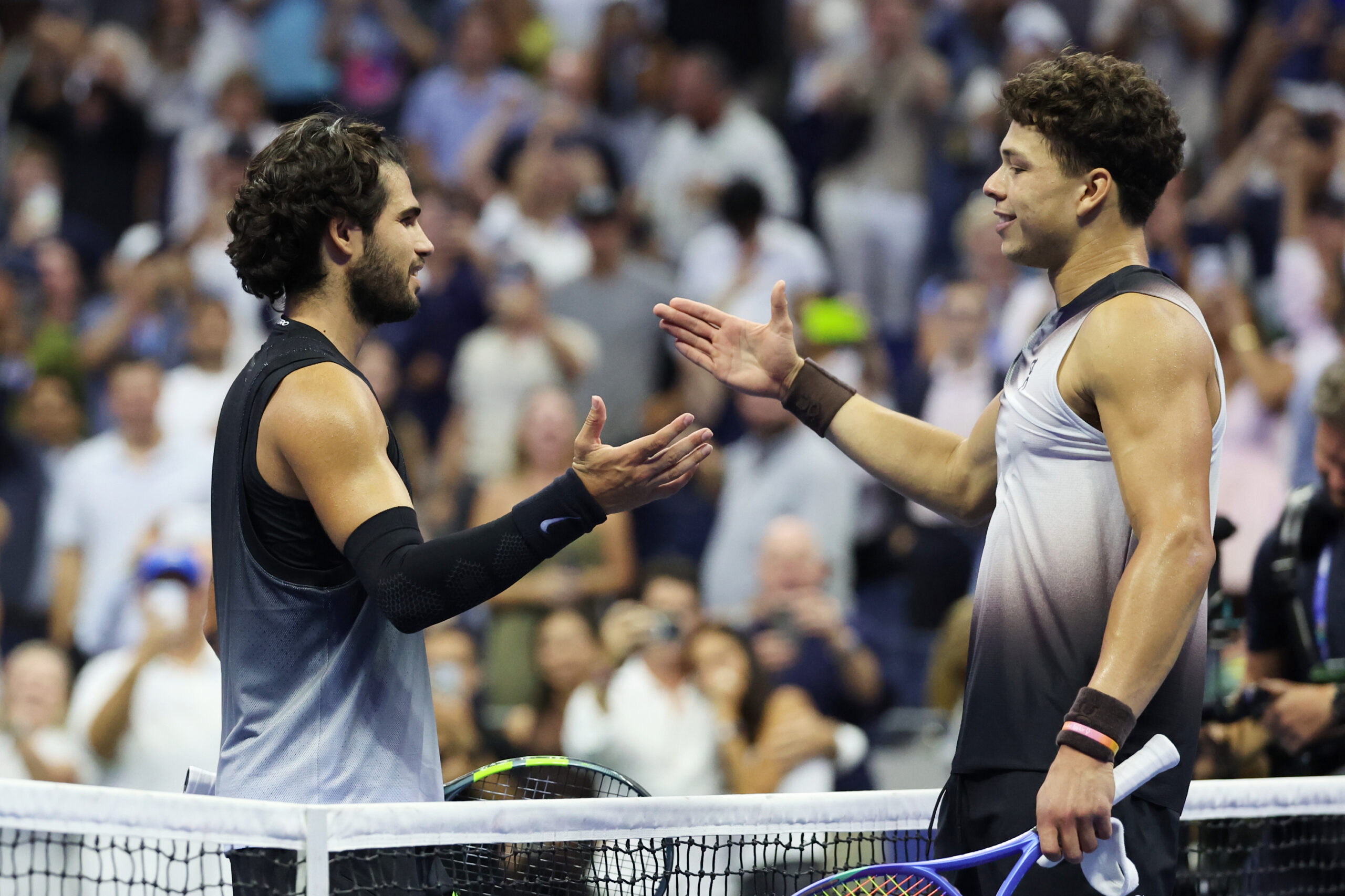 Ben Shelton, right, of the United States, is congratulated by Carlos Alcaraz, of Spain, after winning their match in the quarterfinal round of the U.S. Open tennis championships, Wednesday, Sept. 9, 2026, in New York.