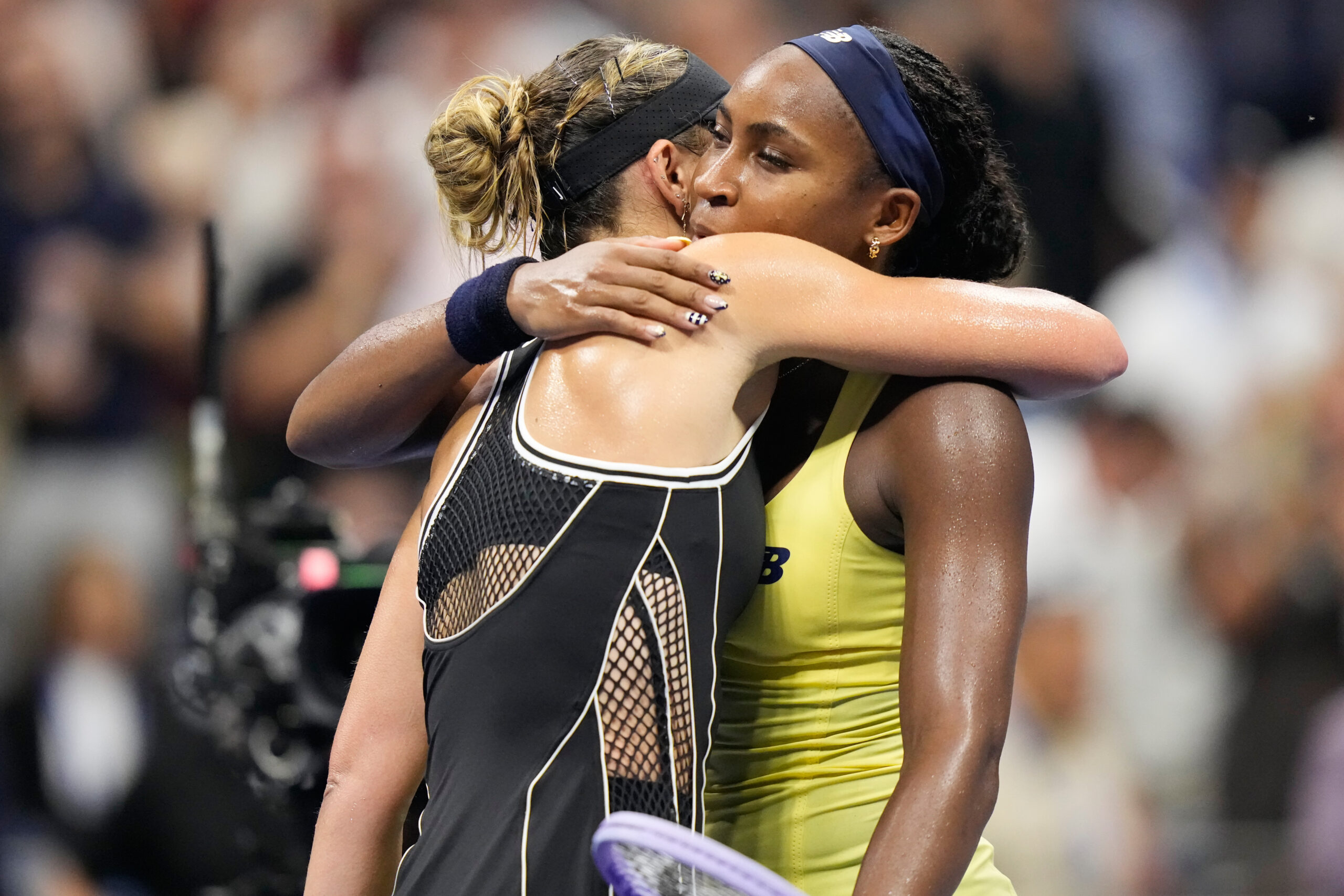 Coco Gauff, right, of the United States, embraces Paula Badosa, of Spain, after Gauff won their match in the second round of the U.S. Open tennis championships, Thursday, Sept. 3, 2026, in New York.