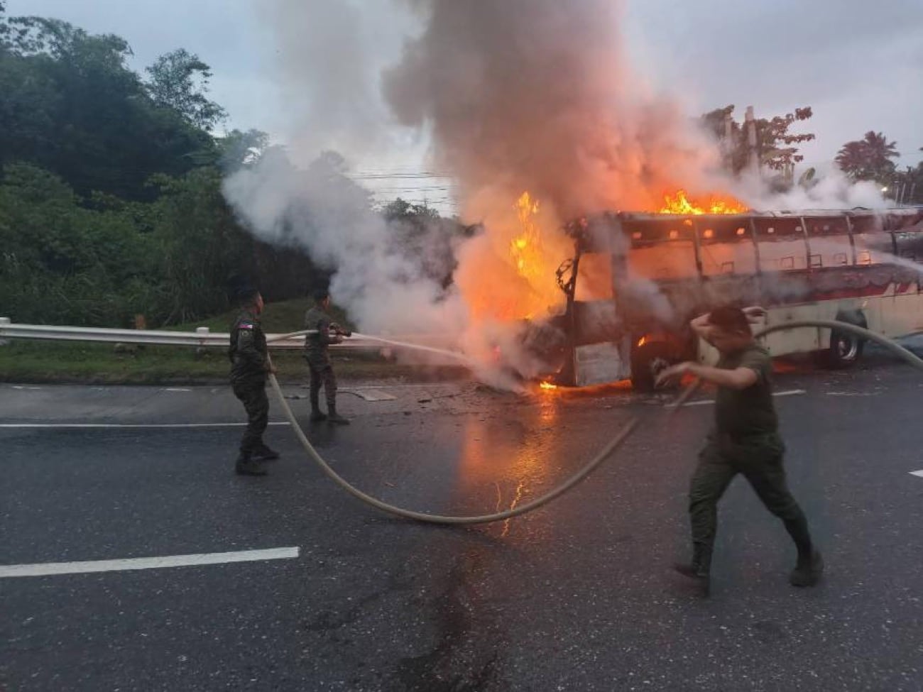 Army troops help extinguish passenger bus fire in Davao de Oro