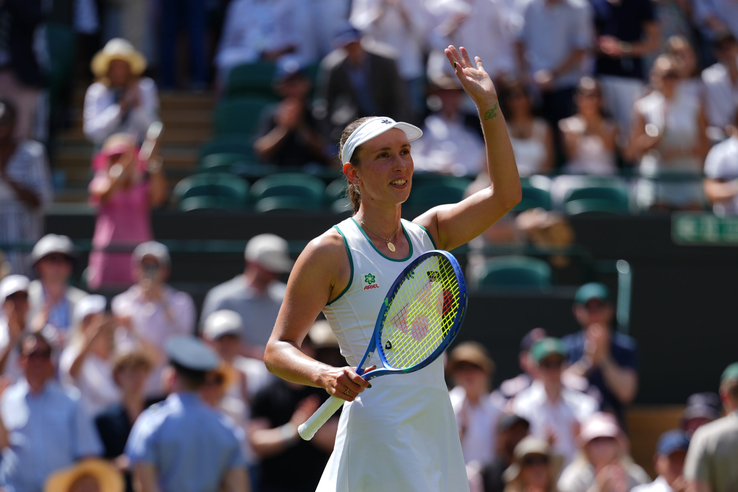 Elise Mertens of Belgium celebrates her victory against Elena Rybakina of Kazakhstan in their third round women's singles match at the Wimbledon Tennis Championships in London, Saturday, July 4, 2026.
