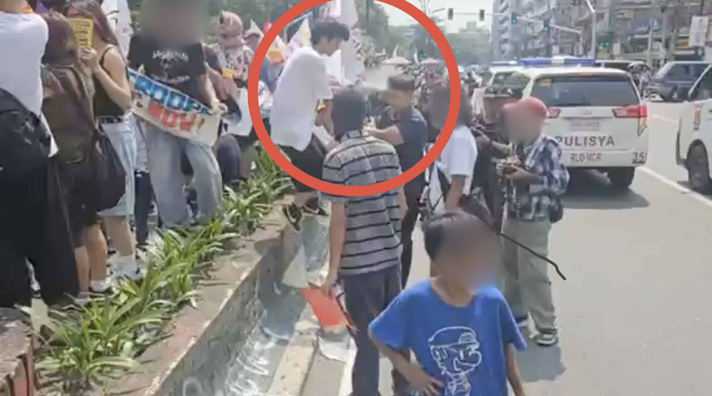 Protester sprays paint on undercover cop in Manila rally