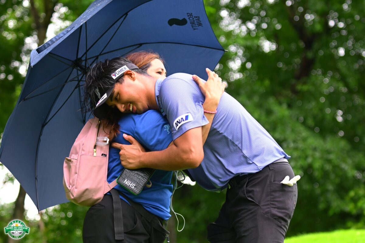 Shin Suzuki gets a much-deserved hug from mom Laurice.