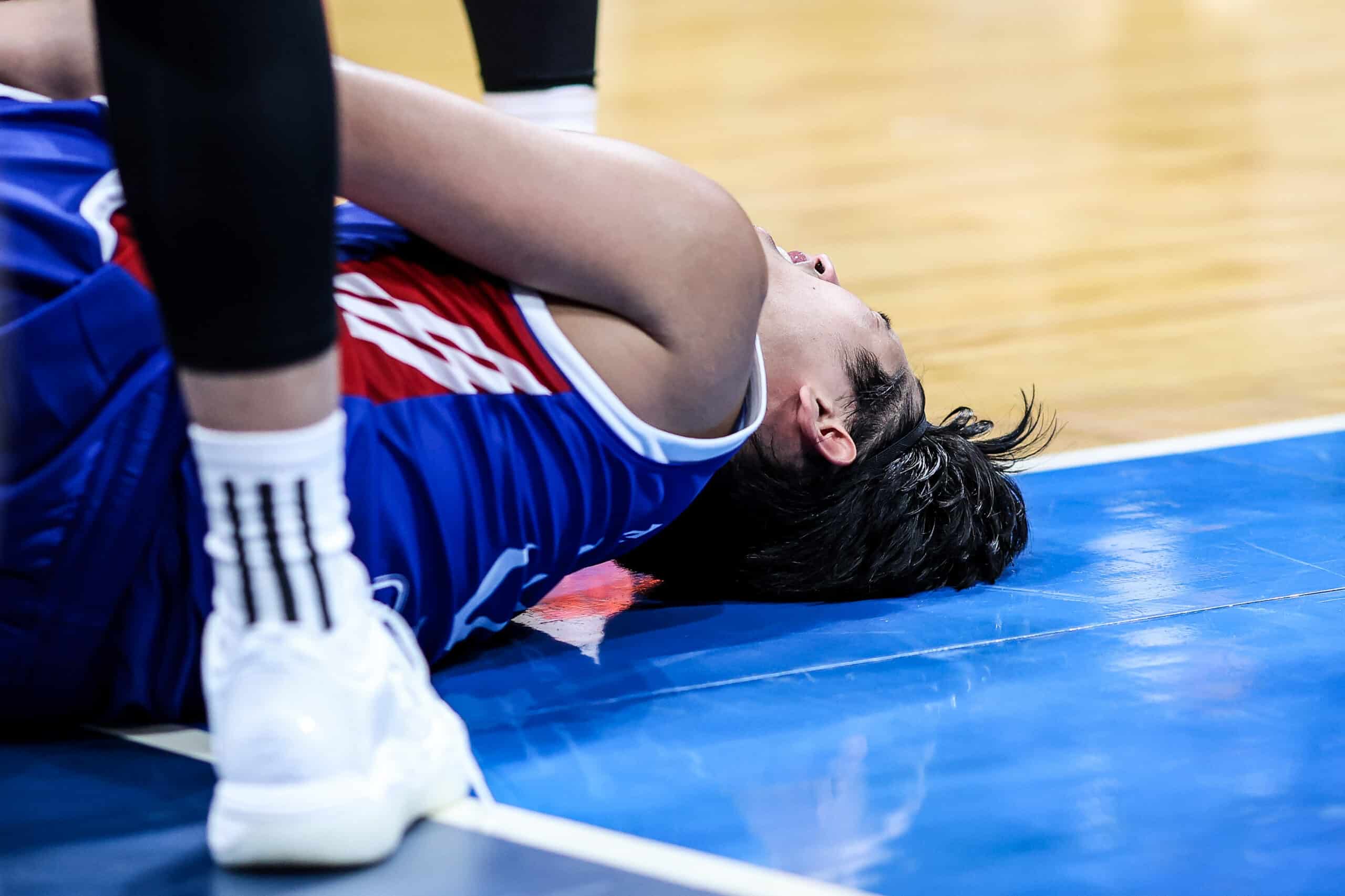 Gilas Pilipinas' Carl Tamayo suffers a sprained ankle during a game vs Jordan in the Fiba World Cup 2027 Asian Qualifiers.