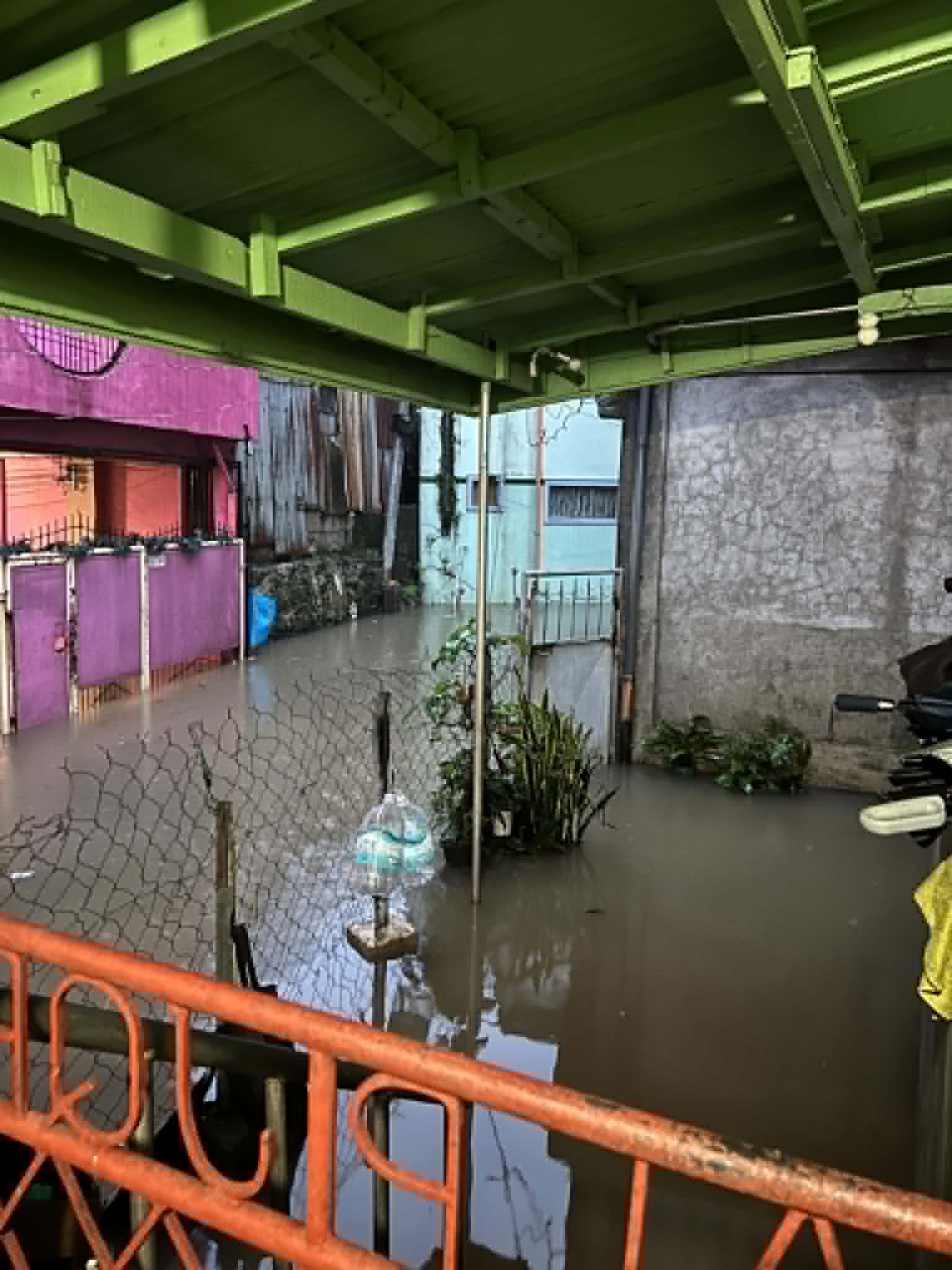 Rising floodwaters inundate houses in Benguet