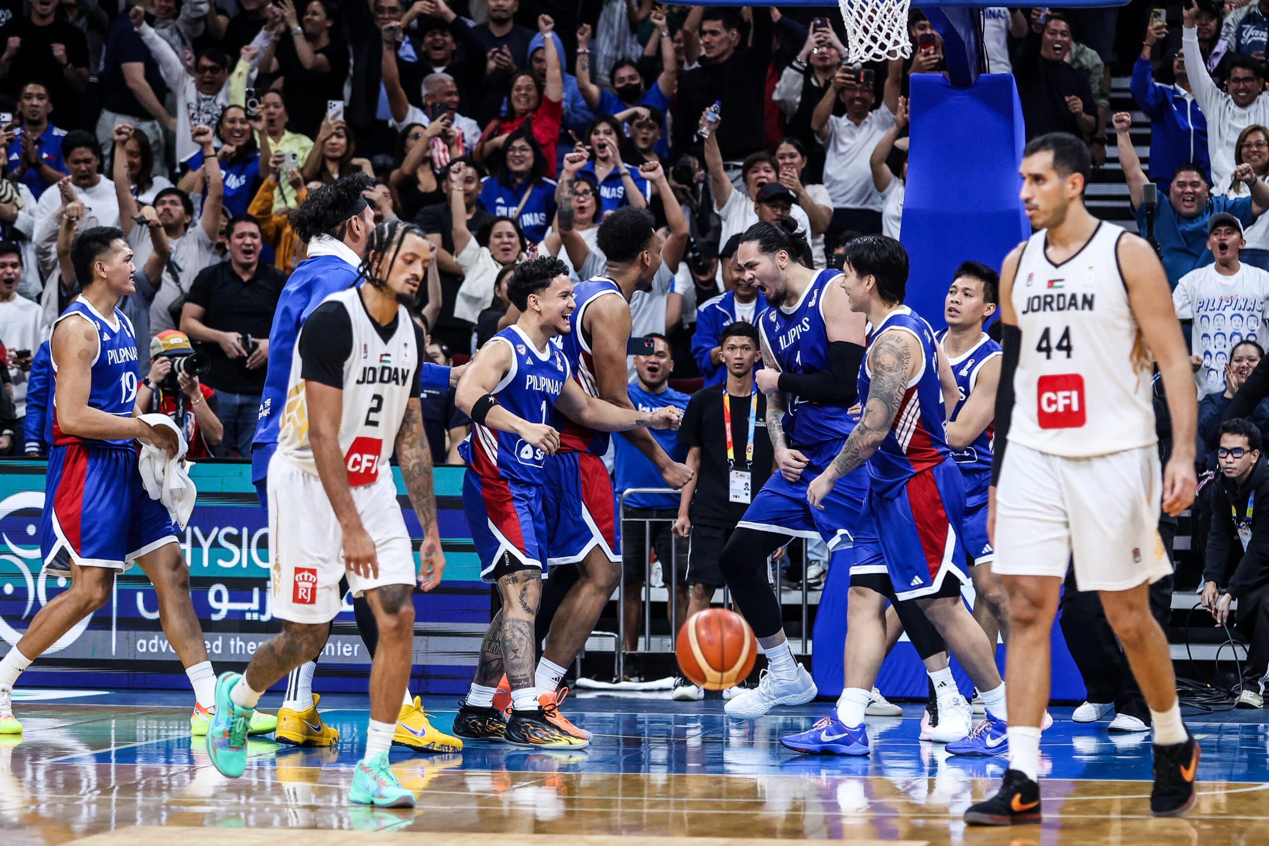 Gilas Pilipinas celebrates after beating Jordan in the Fiba World Cup 2027 Asian qualifiers at Mall of Asia Arena.
