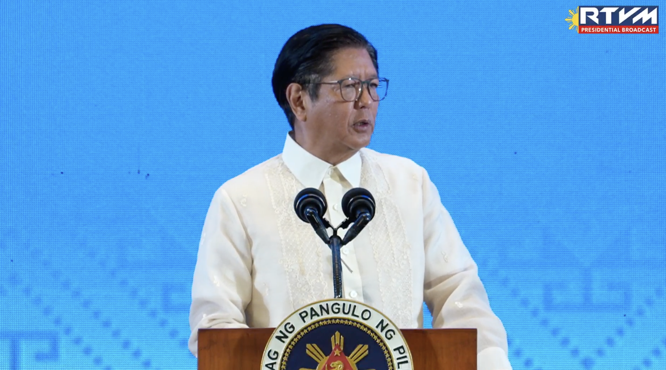 Marcos inspects, hails QC flood control facility