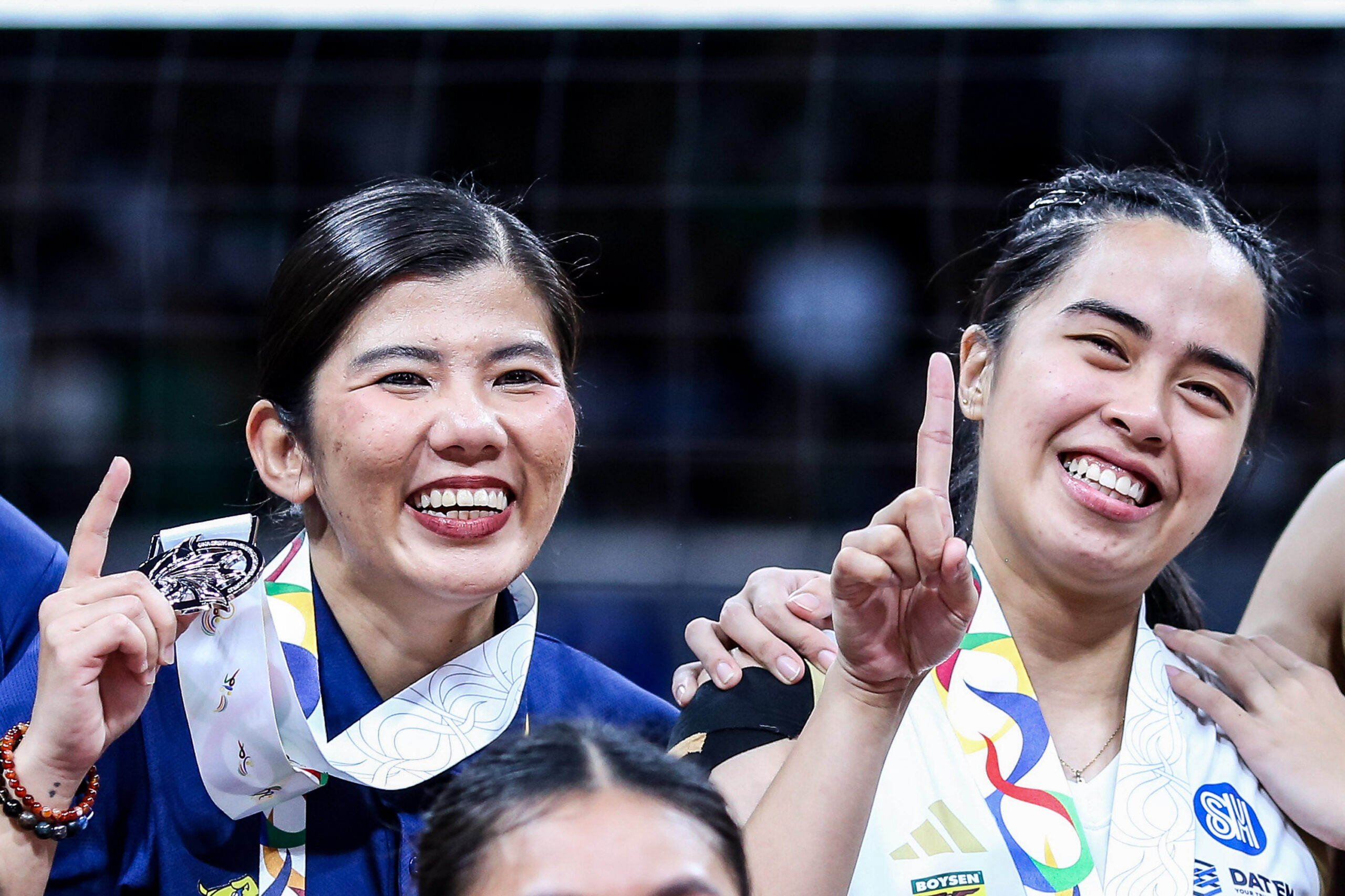 NU Lady Bulldogs' coach Regine Diego and setter Lams Lamina after they settled for silver in the UAAP Season 88 women's volleyball tournament. 