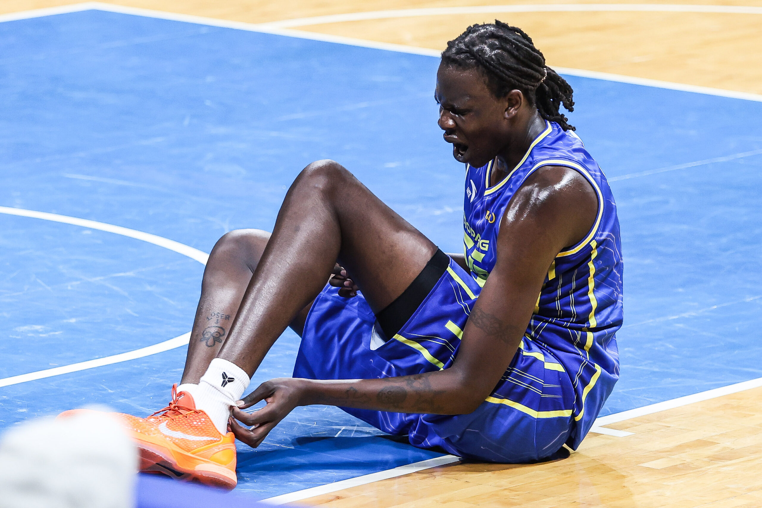 TNT Tropang 5G import Bol Bol suffers an injury during Game 2 of the PBA Commissioner's Cup semifinals vs Meralco Bolts.