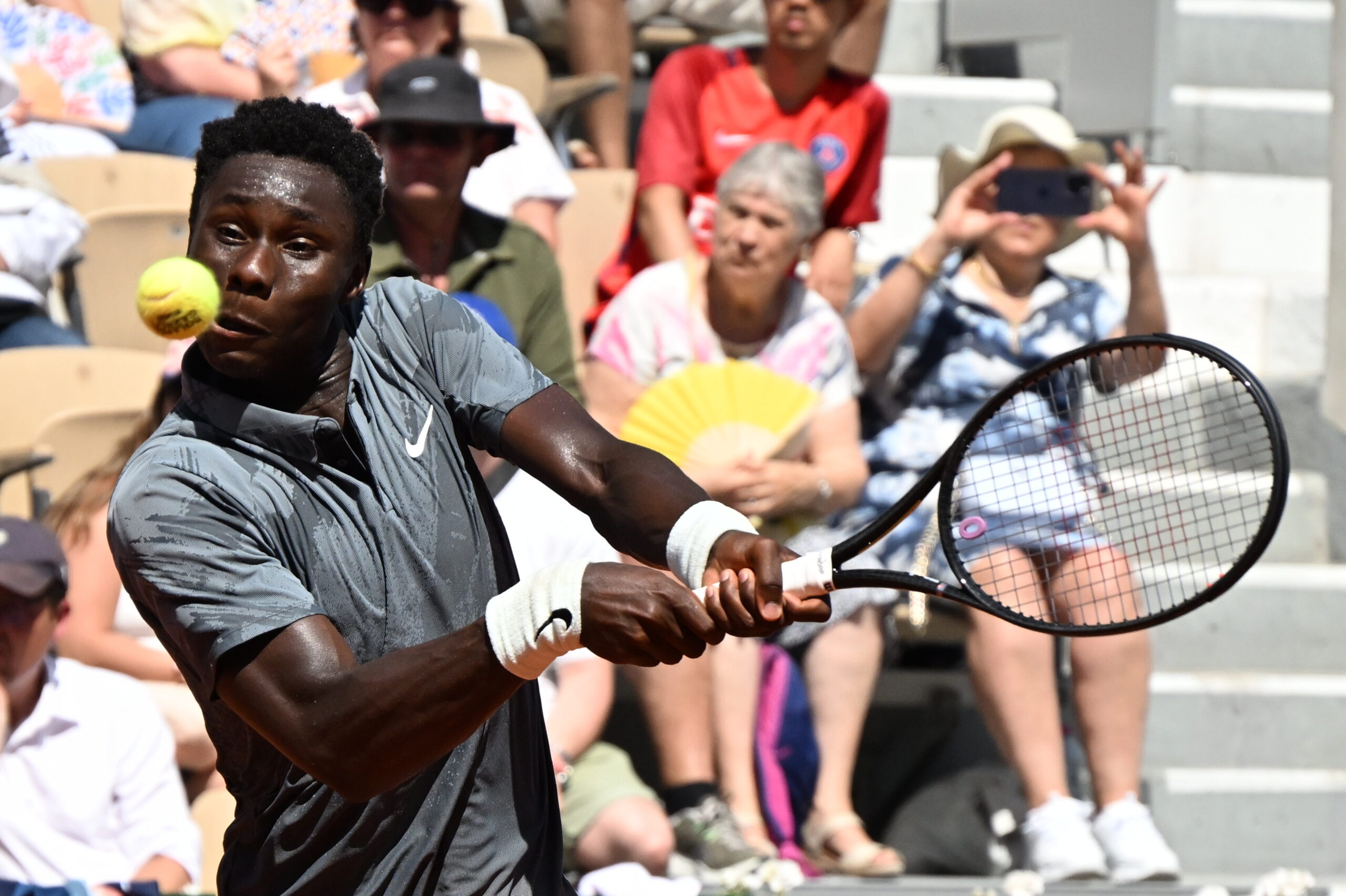 Moise Kouame of France returns to Adolfo Daniel Vallejo of Paraguay during their second round men's singles tennis match at the French Open tennis tournament in Paris, Thursday, May 28, 2026.