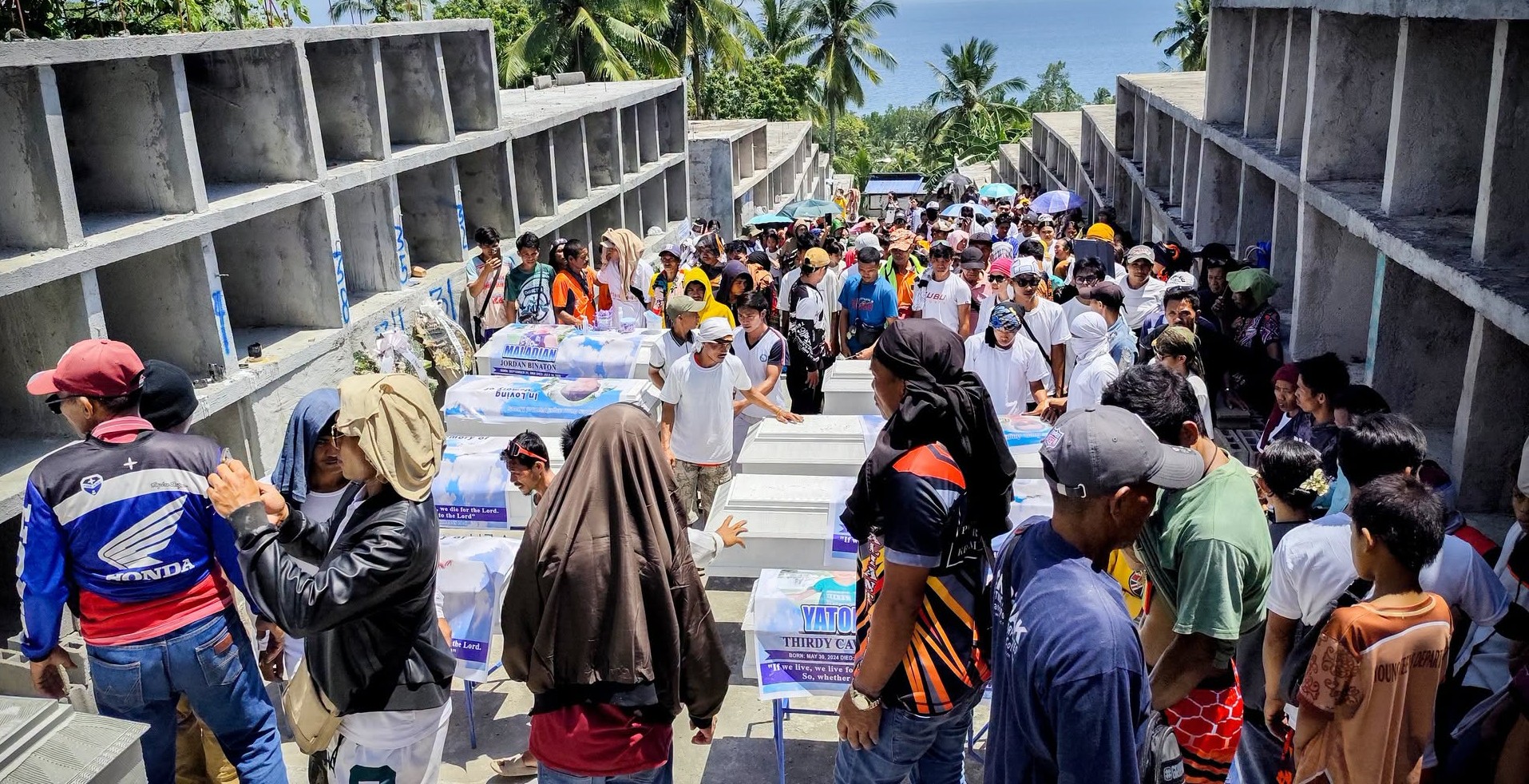 Mass burial held for 9 Sarangani landslide victims