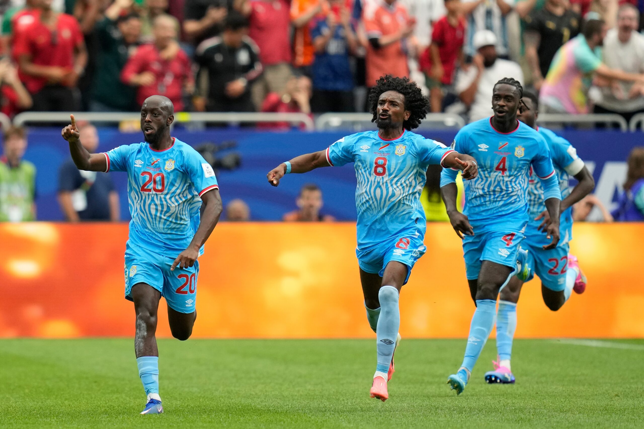 Congo's Yoane Wissa, left, celebrates after scoring his side's first goal during the World Cup Group K soccer match between Portugal and Congo in Houston, Wednesday, June 17, 2026. (