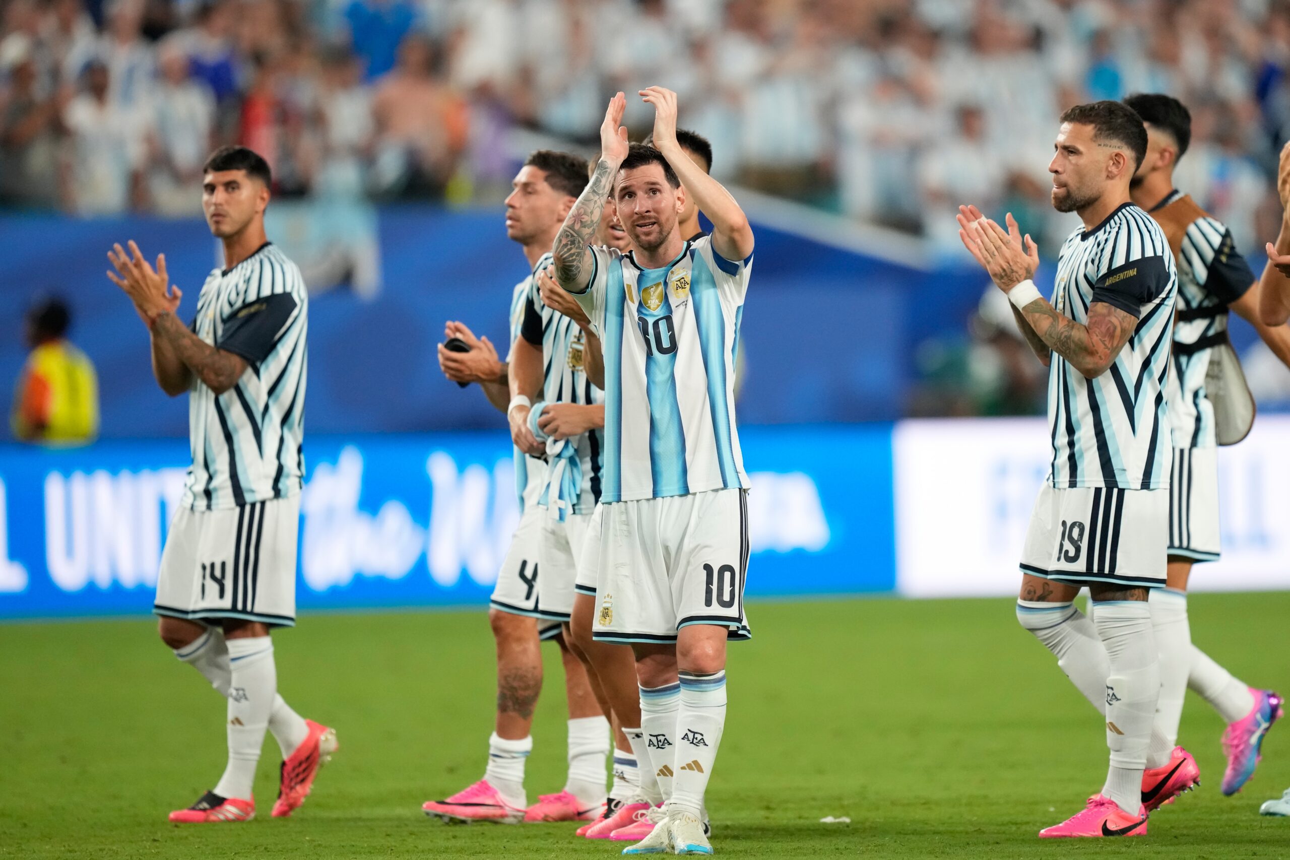 Argentina's Lionel Messi, center, celebrates after the World Cup round of 32 soccer match against Cape Verde in Miami Gardens, Fla., Friday, July 3, 2026.