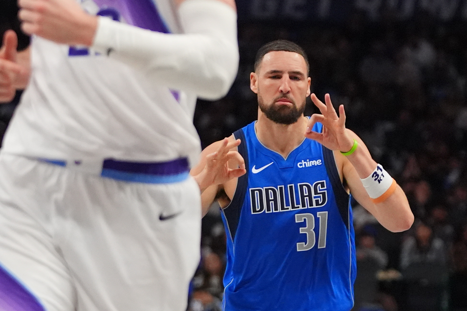 Dallas Mavericks guard Klay Thompson (31) gestures after scoring a 3-pointer during the first half of an NBA basketball game against the Utah Jazz in Dallas, Thursday, Jan. 15, 2026.