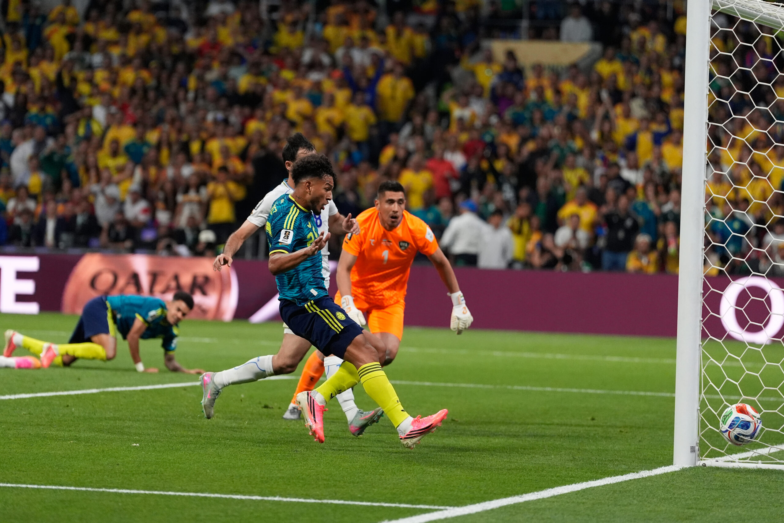Uzbekistan goalkeeper Utkir Yusupov (1) fails to save the goal from Colombia's Luis Diaz (7), left, during the World Cup Group K soccer match between Uzbekistan and Colombia in Mexico City, Wednesday, June 17, 2026.