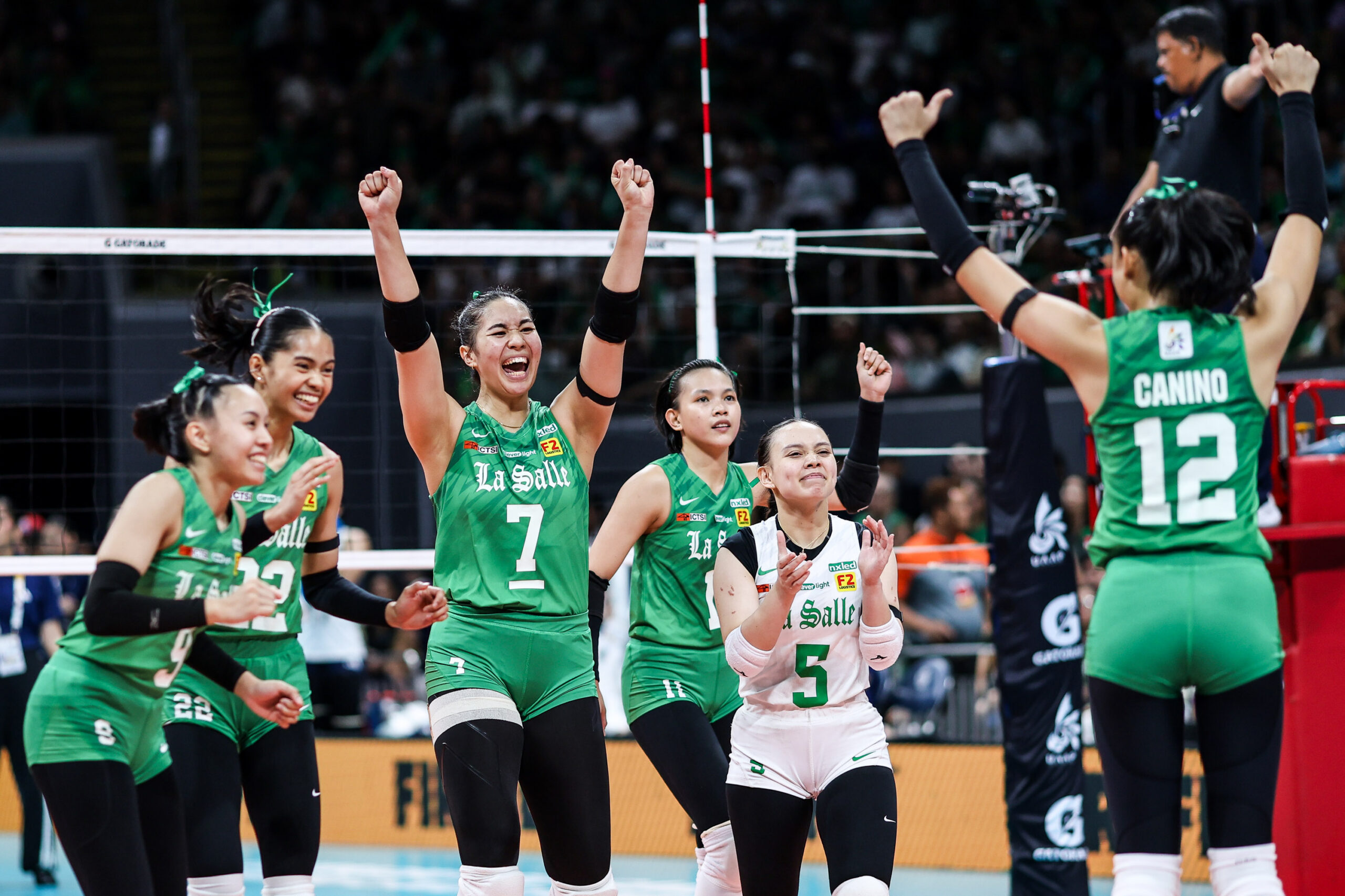 Shevana Laput and the La Salle Lady Spikers react after a point during the UAAP Season 88 women's volleyball Finals vs NU Lady Bulldogs.