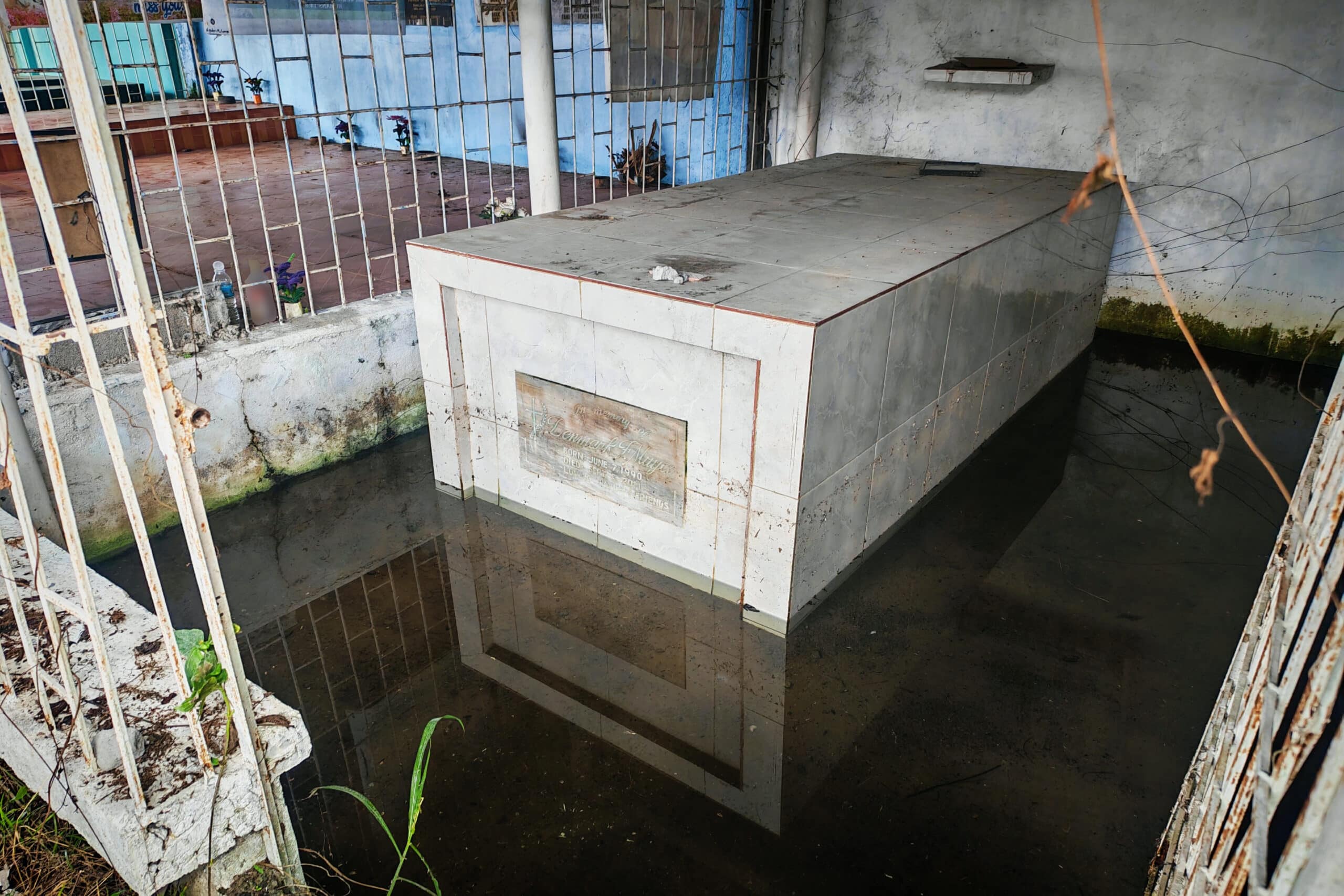 Floodwaters submerge graves in South Cotabato cemetery ahead of Undas