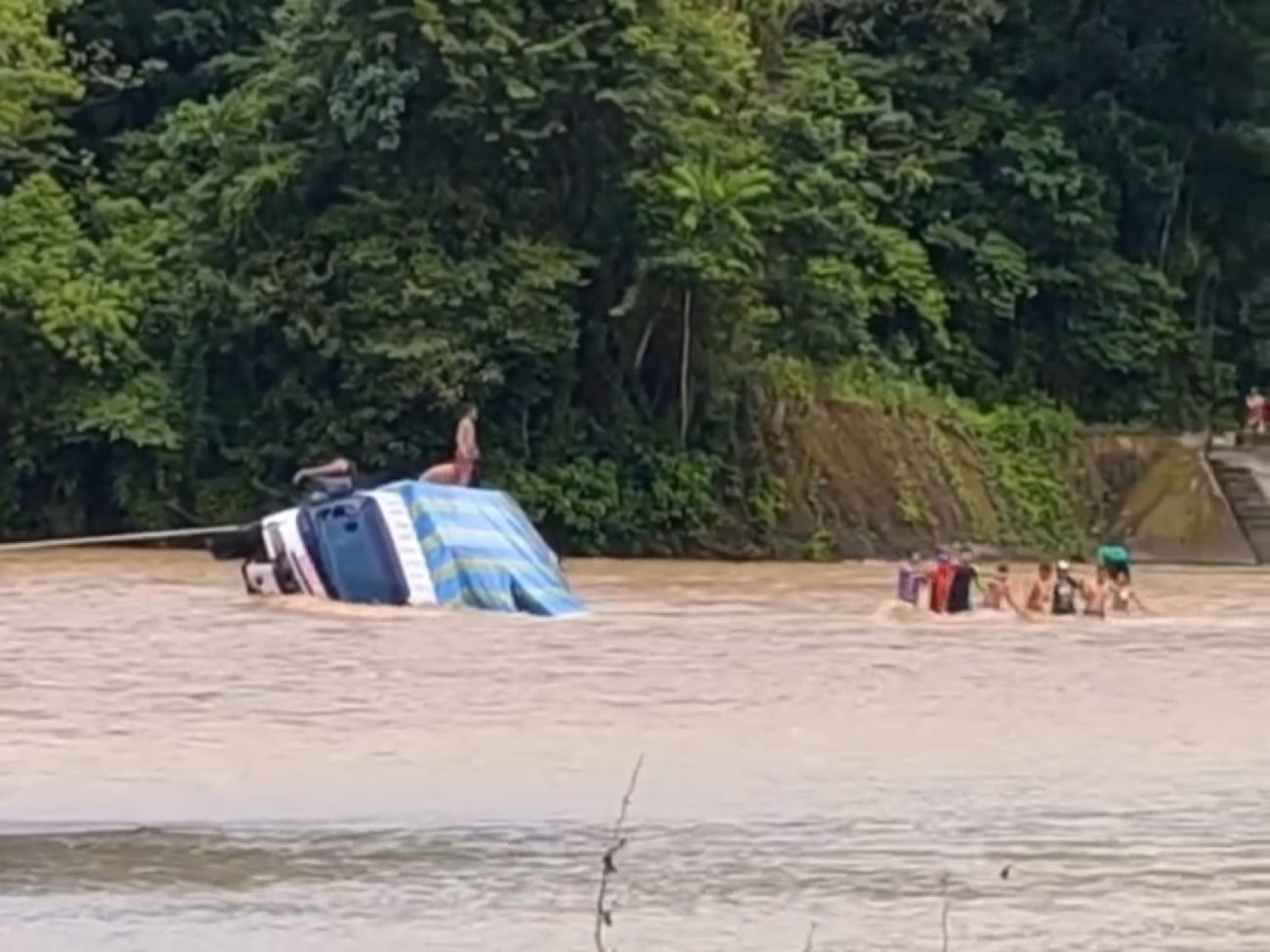 Truck carrying passengers flips amid raging river in Zamboanga del Norte