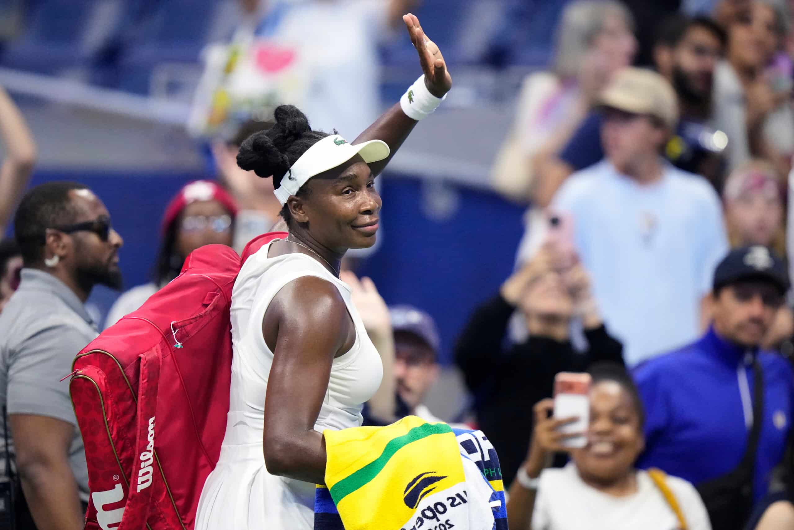 Venus Williams, of the United States, waves as she leaves the court following her first round loss to compatriot Sofia Kenin at the U.S. Open tennis championships, Monday, Aug. 31, 2026, in New York.