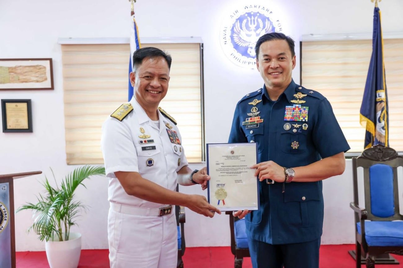 Newly promoted Air Force Brig. Gen. Mikee Romero gets rare Navy honors