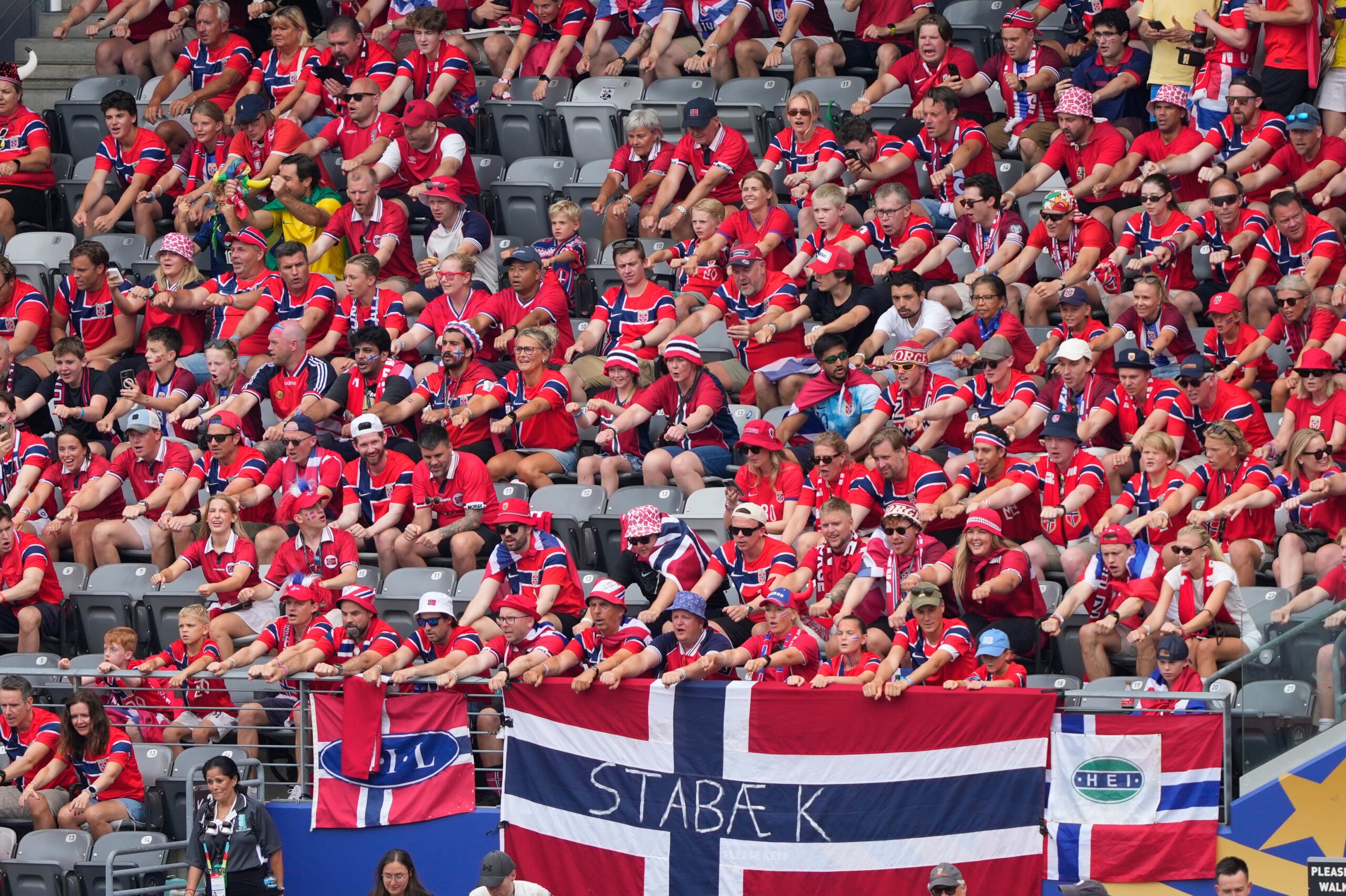 Norwegian fans perform a viking boat row before the World Cup round of 16 soccer match between Brazil and Norway in East Rutherford, N.J., near New York, Sunday, July 5, 2026.