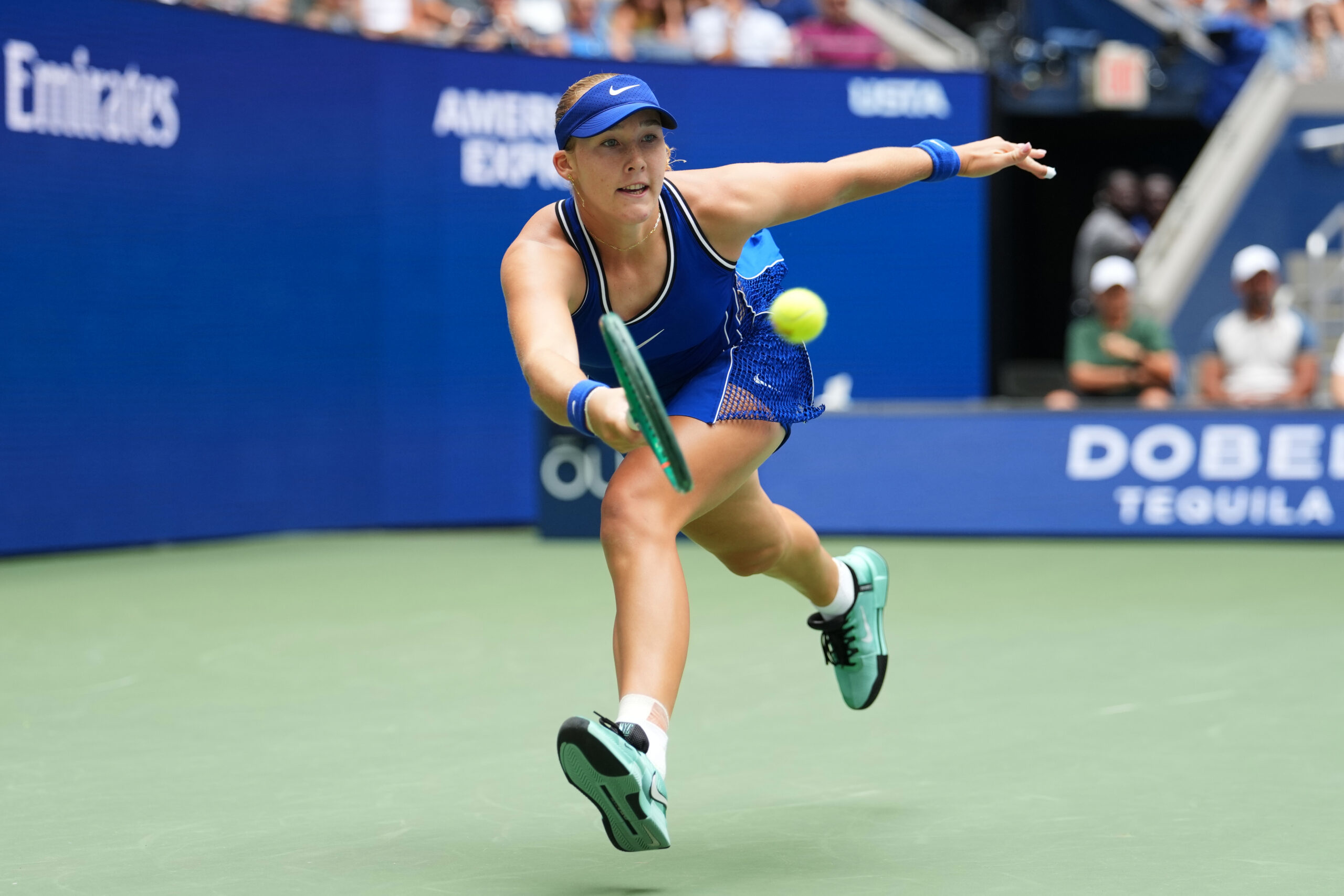Mirra Andreeva, of Russia, returns the ball to Coco Gauff, of the United States, during the quarterfinal round of the U.S. Open tennis championships, Wednesday, Sept. 9, 2026, in New York.